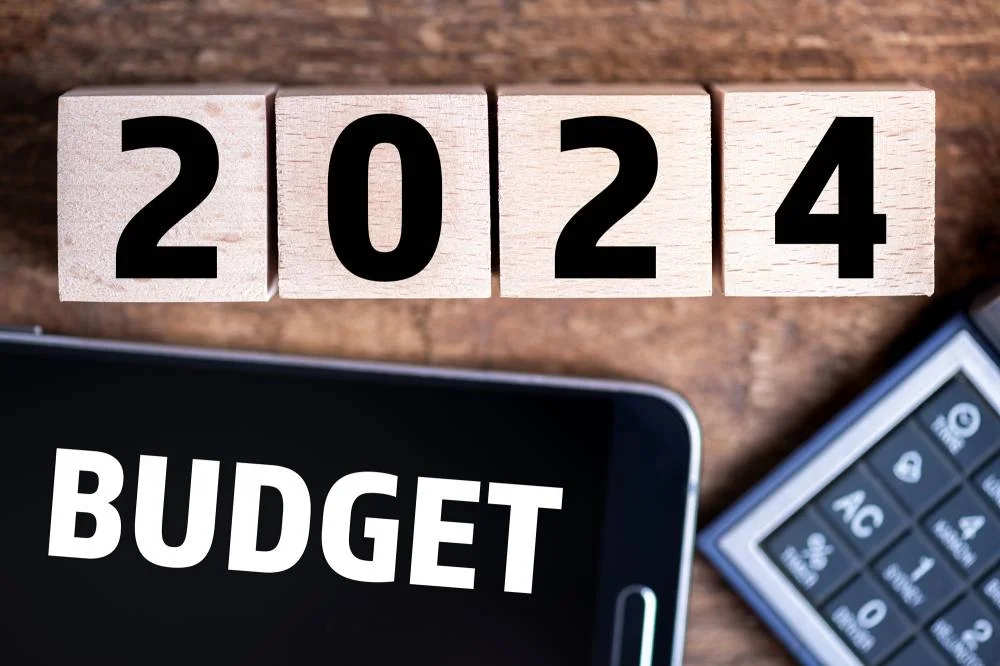 Budget 2024 new year on wooden blocks and office business concept background. 2024 Budget planning and allocation concept concept. 2024 New year resolutions, goals