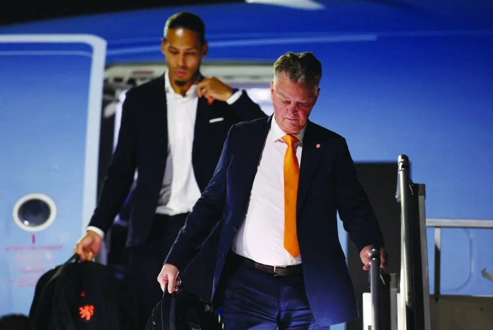 Soccer Football - FIFA World Cup Qatar 2022 Arrival - Netherlands team arrives in Doha - Hamad International Airport, Doha, Qatar - November 15, 2022
Netherlands coach Louis van Gaal and Virgil van Dijk arrive in Doha ahead of the FIFA World Cup Qatar 2022 REUTERS/Amr Abdallah Dalsh