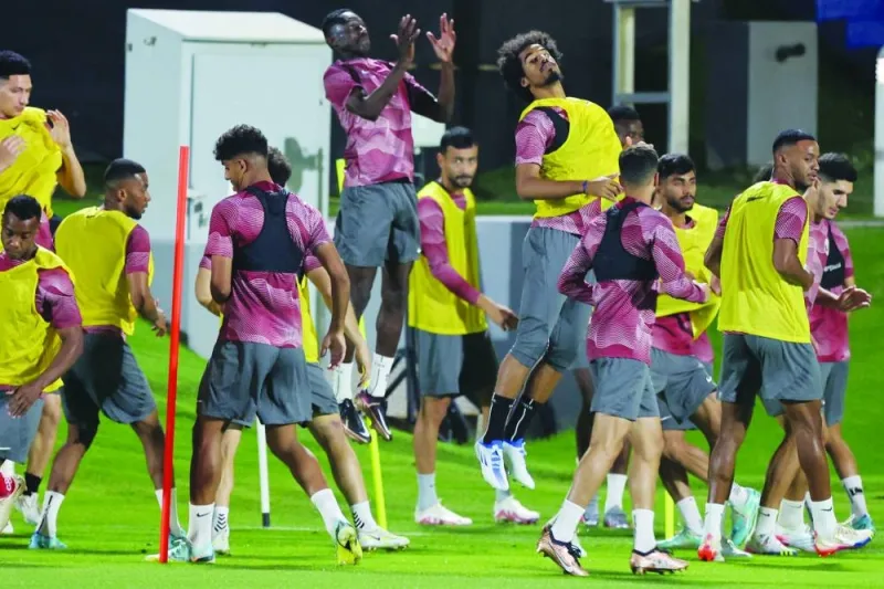 Qatar's players attend a training session in Doha on November 15, 2022, ahead of the Qatar 2022 World Cup football tournament. (Photo by KARIM JAAFAR / AFP)