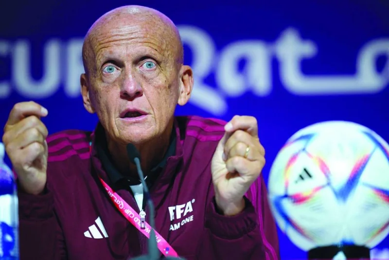 FIFA referees committee chairman Pierluigi Collina addresses a press conference at the Qatar National Convention Center in Doha, yesterday. (AFP)