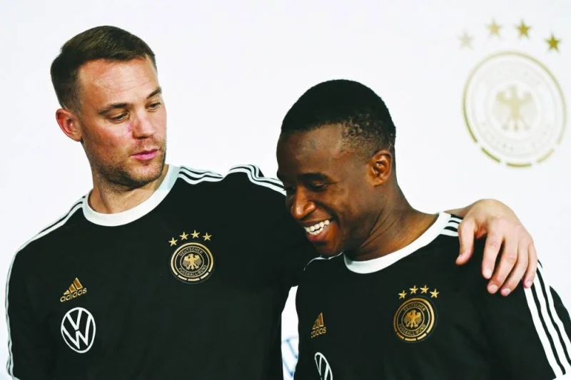 Germany&#039;s goalkeeper Manuel Neuer (L) and Germany&#039;s forward Youssoufa Moukoko leave after holding a press conference at Al Shamal Stadium in Al Shamal, north of Doha, on November 19, 2022, ahead of the Qatar 2022 World Cup football tournament. (Photo by Ina FASSBENDER / AFP)