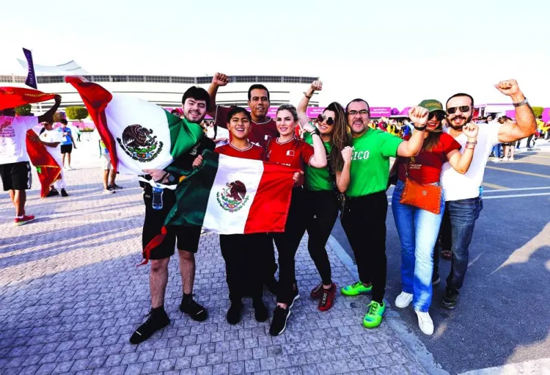 Mexico fans pose outside the Al Bayt Stadium in Al Khor yesterday.