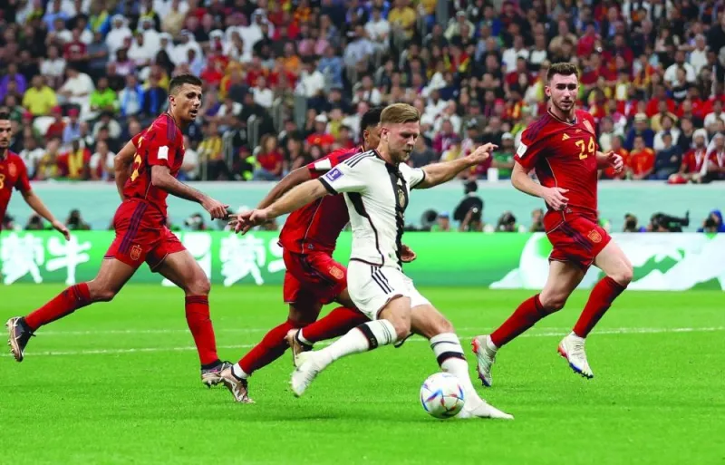 Germany's Niclas Fullkrug scores their first goal against Spain at Al Bayt Stadium yesterday. (Reuters)