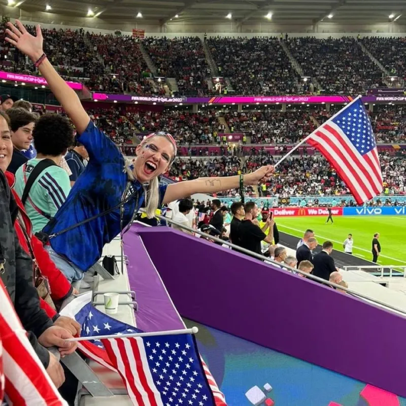 Holland cheers the US team at the US-Wales match