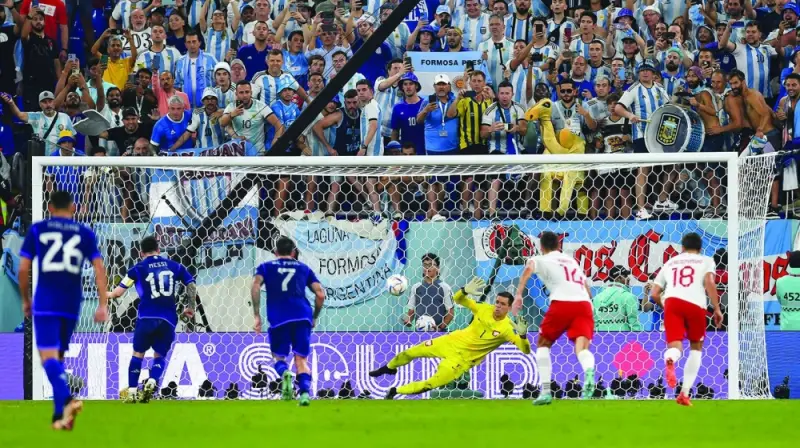 Poland&#039;s Wojciech Szczesny saves a penalty from Argentina&#039;s Lionel Messi.