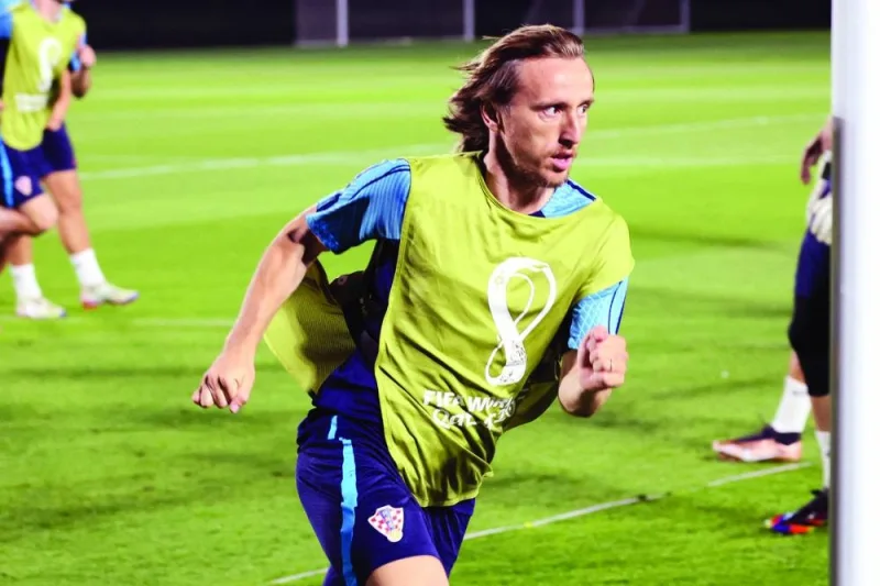 Croatia's midfielder Luka Modric takes part in a training session at the Al Erssal Training Site 3 in Doha. (AFP)