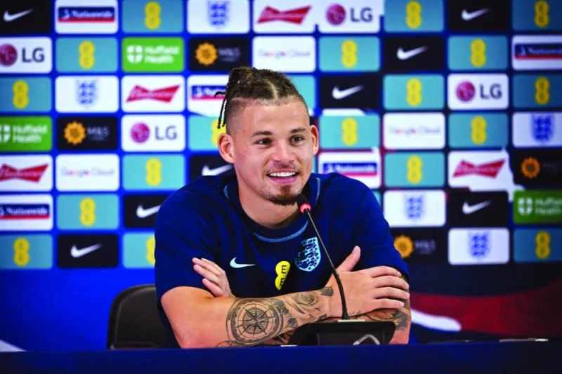 England's midfielder Kalvin Phillips smiles during a press conference at the Al Wakrah Stadium in the build-up to the Qatar 2022 World Cup quarter-final against France tomorrow. (AFP)