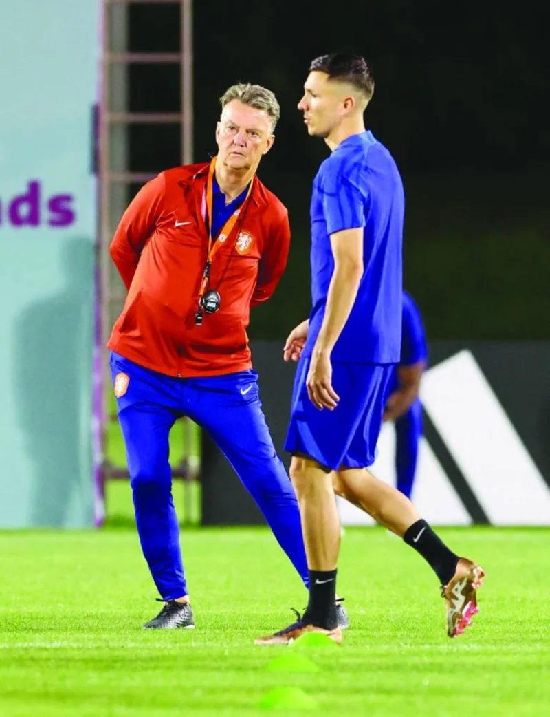 Netherlands coach Louis van Gaal (left) with Steven Berghuis during a training session yesterday. (Reuters)