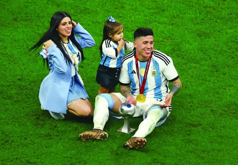 Argentina’s Enzo Fernandez, who was named as the best young player of Qatar World Cup, celebrates with his wife Valentina Cervantes and daughter. (Reuters)