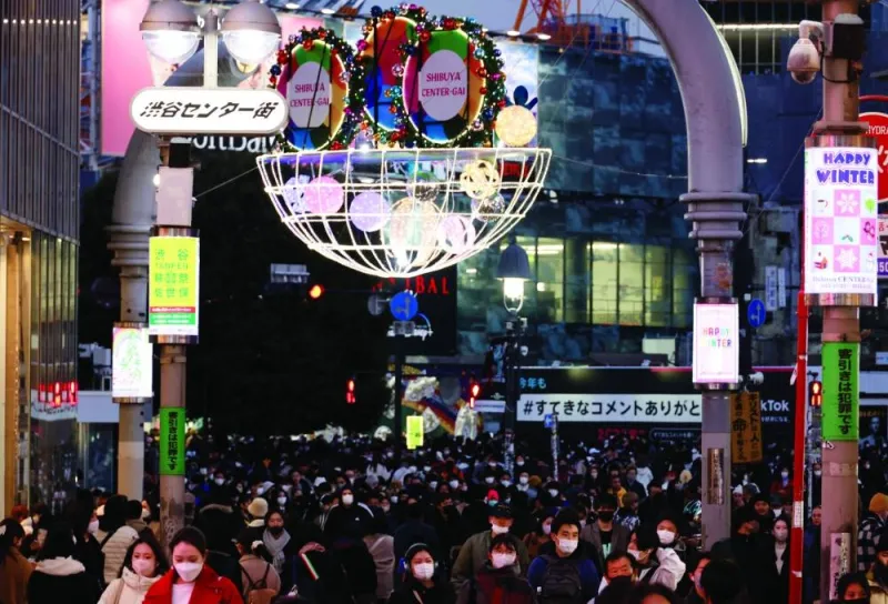 People make their way at a shopping district in Tokyo. Prices in Japan rose at their fastest pace since 1981 in November, data showed yesterday, fuelled in part by higher energy costs.