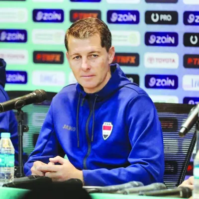 Iraq coach Casas at a press conference.
