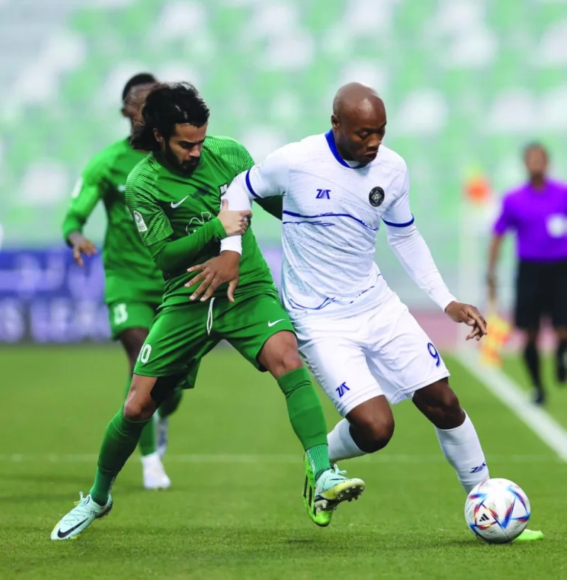 Al Ahli and Al Sailiya players battle for ball possession in Week 9 action of the 2022-2023 season QNB Stars League at the Al Ahli Stadium. Al Ahli won 2-1.