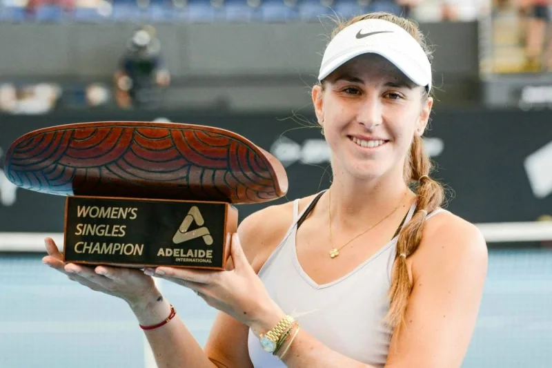 Switzerland&#039;s Belinda Bencic poses with the trophy after winning against Russia&#039;s Daria Kasatkina in their women&#039;s singles final match (AFP)