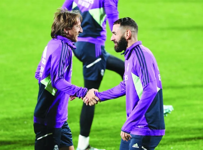 Real Madrid’s Karim Benzema (right) and Luka Modric during a training session at the Al Nassr Club in Riyadh yesterday. (Reuters)