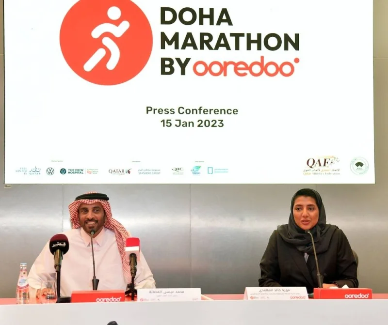 Mohamed Issa al-Fadala and Moza Khalid al-Muhannadi announcing details of the ‘Doha Marathon by Ooredoo 2023’ Sunday. PICTURE: Shaji Kayamkulam.
