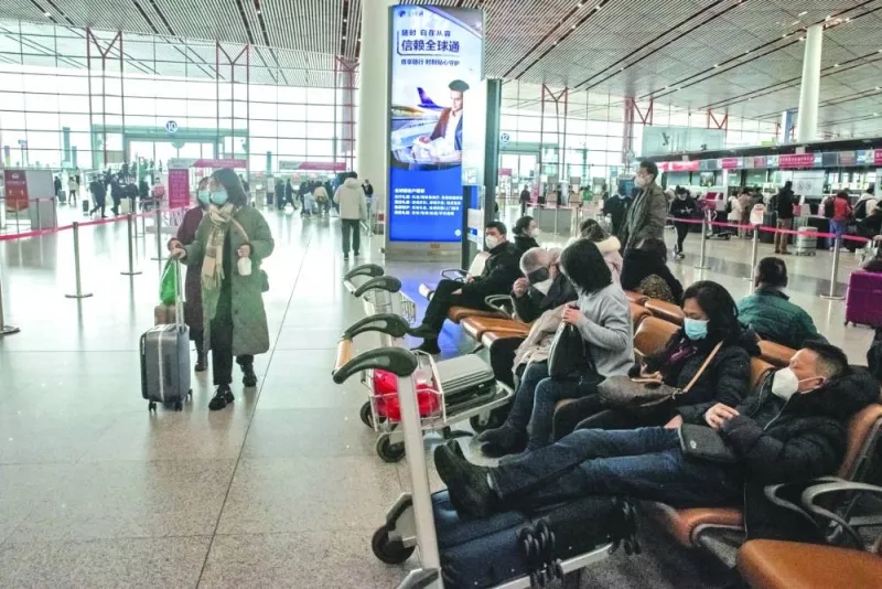 Travellers at Beijing Capital International Airport. China recently removed quarantine requirements for inbound travellers and green-signalled international travel, abandoning its ‘Covid Zero’ policy in favour of reopening of its economy. 
