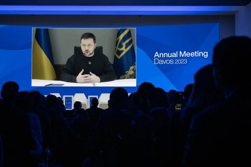 Ukrainian President Volodymyr Zelensky is displayed on a screen via video link at the Congress centre during the World Economic Forum (WEF) annual meeting in Davos (AFP)