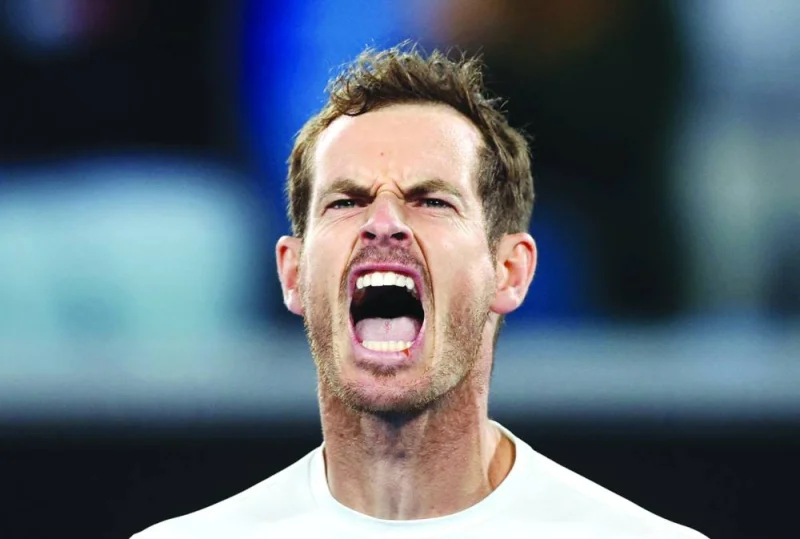 Britain’s Andy Murray celebrates after defeating Australia’s Thanasi Kokkinakis in their Australian Open match in Melbourne yesterday. (AFP)