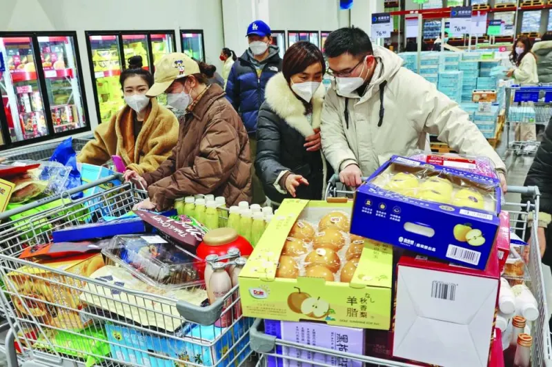 Residents shop at a supermarket in Nantong, in China’s eastern Jiangsu province. 