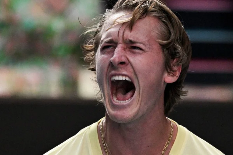 USA&#039;s Sebastian Korda reacts after winning against Poland&#039;s Hubert Hurkacz during their men&#039;s singles match on day seven of the Australian Open tennis tournament in Melbourne on January 22, 2023. (AFP)