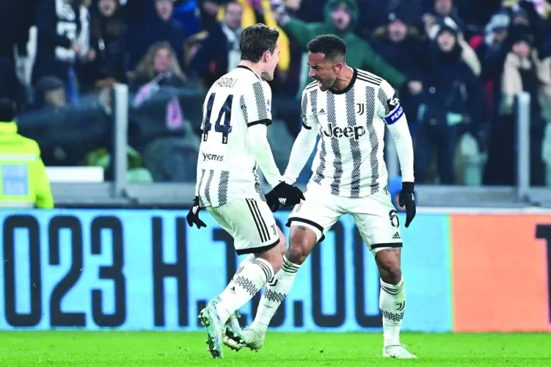 Juventus’ Danilo (right) celebrates with Nicolo Fagioli after scoring against Atalanta. (AFP)