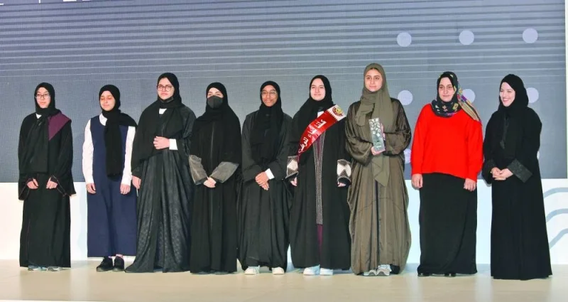Sheikha Noof Ahmed al-Thani (right) with the winners of a project.