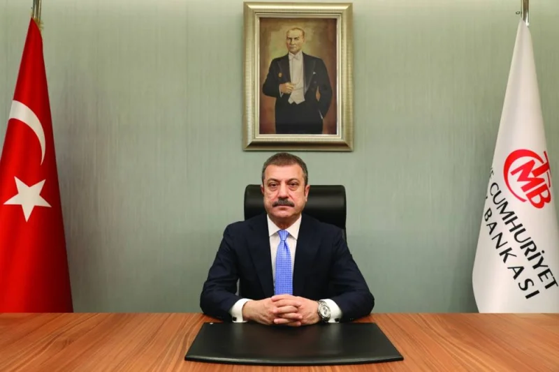 Turkiye’s central bank governor Sahap Kavcioglu at his office in Ankara (file). Presenting a quarterly economic report yesterday, Kavcioglu stood by previous year-end annual inflation forecasts for 2023 and 2024 of 22.3% and 8.8% respectively.