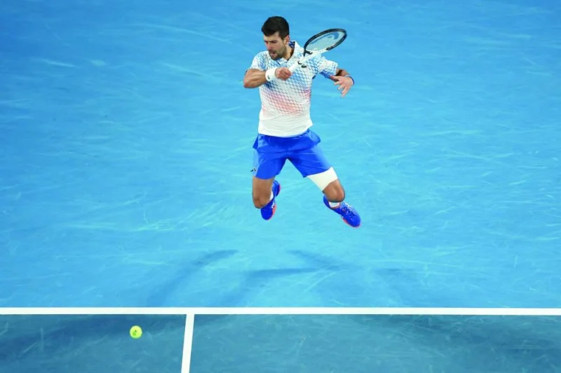 Serbia&#039;s Novak Djokovic hits a return against Russia&#039;s Andrey Rublev during their singles quarter-final match on day ten of the Australian Open in Melbourne on Thursday. (AFP)