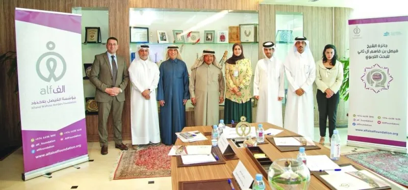 HE Sheikh Faisal bin Qassim al-Thani with other officials