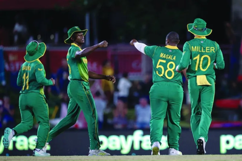 South Africa’s Sisanda Magala celebrates with teammates after the dismissal of England’s Moeen Ali (not pictured) during the first ODI in Bloemfontein. (AFP)