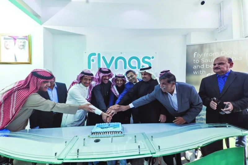Officials at the opening of the flynas office in Doha.