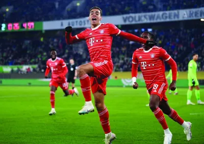 Bayern Munich's Jamal Musiala celebrates scoring their fourth goal against Wolfsburg yesterday. (Reuters)