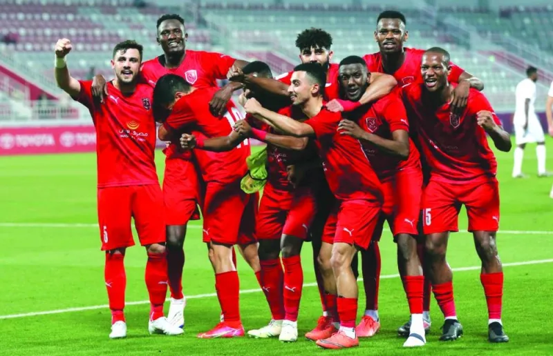 Al Duhail players celebrate after their win over Al Markhiya in the QNB Stars League on Monday. 