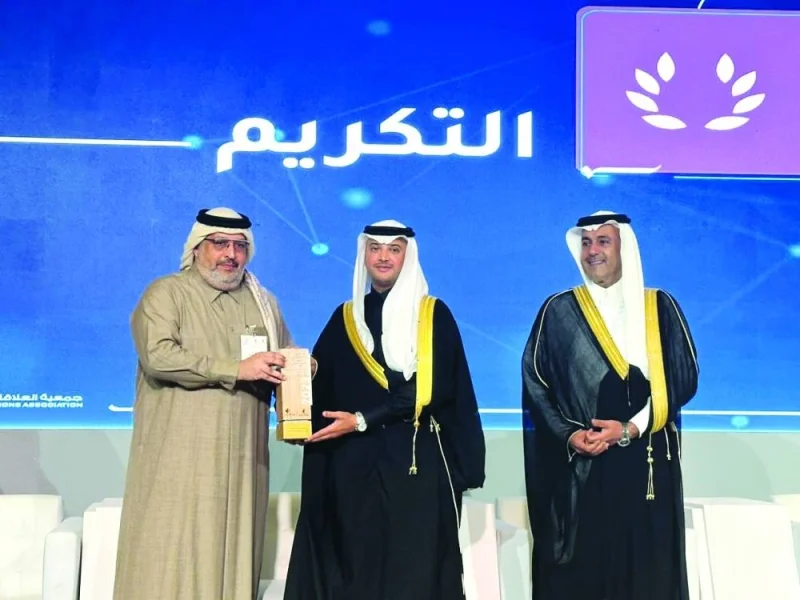 Prince Saud bin Talal bin Badr, Governor of Al-Ahsa honoured al-Mudahka (left) for his participation in the forum.
