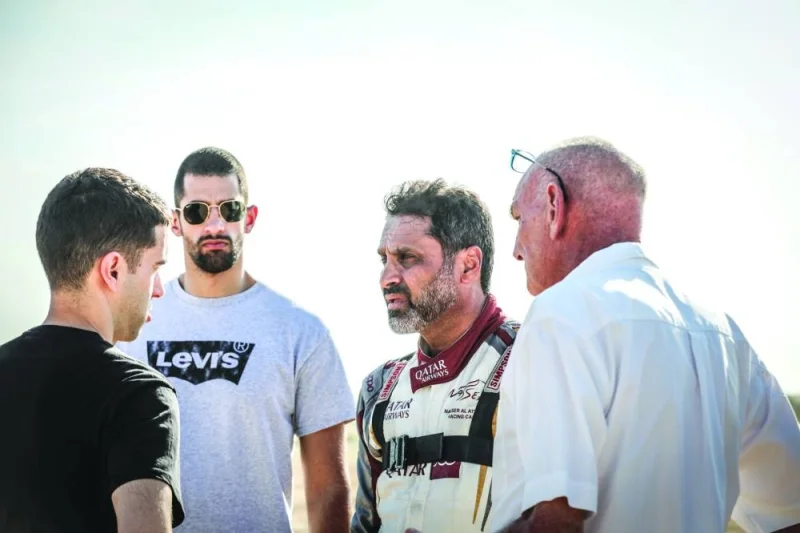 Qatari ace Nasser Saleh al-Attiyah (second right) at the shakedown yesterday.