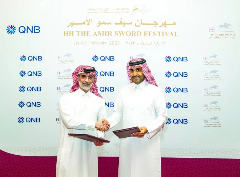 QREC Chairman Issa bin Mohamed al-Mohannadi (right) with QNB Vice-President External Communications Yousef Fakhroo after signing sponsorship agreement.