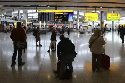 Passengers look at a departure information board inside London Heathrow airport&#039;s Terminal 2 (file). Global airlines are expected to return to operating profitability in the last quarter of 2023, after three consecutive years of losses as passenger demand is set to rapidly recover to pre-pandemic levels on most routes this year.