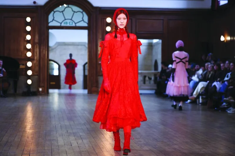 A model presents creations during the Bora Aksu catwalk show during London Fashion Week, in London, yesterday.