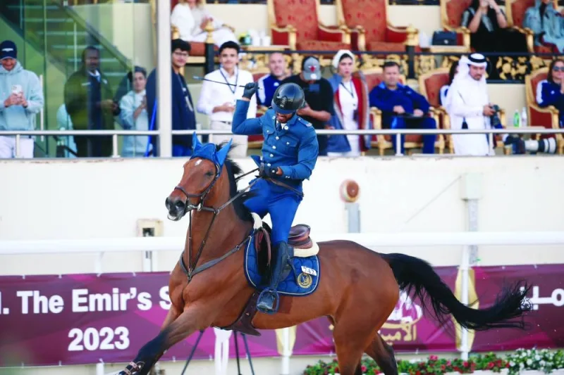Ghanim Nasser al-Qadi celebrates with his stallion Morocco after winning HH The Amir Sword at the Qatar Equestrian Federation’s Outdoor Arena on Saturday.