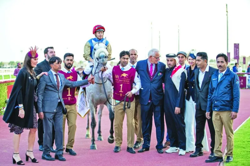 The connections of Abbes, including trainer Alban de Mieulle and jockey Mickael Barzalona, celebrate after the HH The Amir Sword victory on Saturday.
