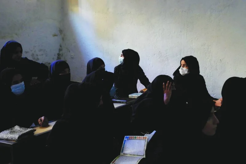 Afghan women learn how to read the Holy Qur’an in a madrasa in Kabul last year. (Reuters)