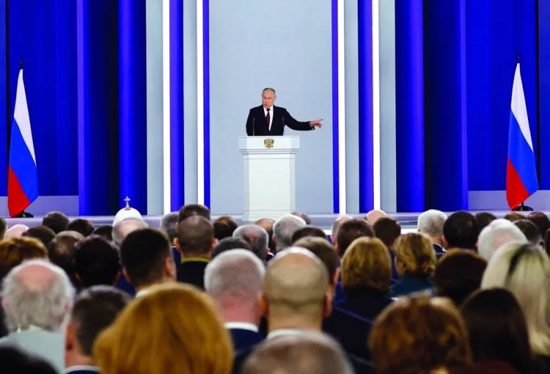 Russian President Vladimir Putin delivers his annual address to the Federal Assembly in Moscow on Tuesday. (Reuters)