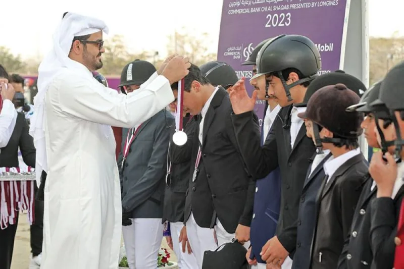 Qatar Olympic Committee President and Al Shaqab Chairperson HE Sheikh Joaan bin Hamad al-Thani awards the medals to participants of the children’s competition at the Commercial Bank CHI Al Shaqab Presented by Longines.
