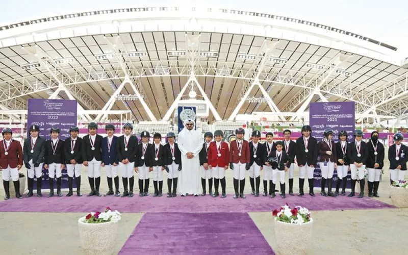 Qatar Olympic Committee President and Al Shaqab Chairperson HE Sheikh Joaan bin Hamad al-Thani poses with the participants of future riders’ children’s competition at the Commercial Bank CHI Al Shaqab Presented by Longines.