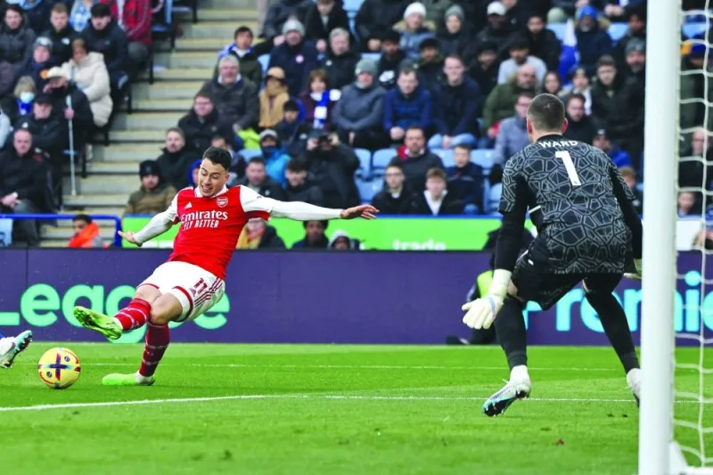 Arsenal’s Gabriel Martinelli scores against Leicester during the Premier League match in Leicester, central England, yesterday. (AFP)
