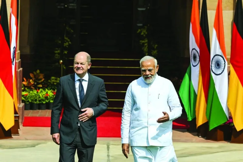German Chancellor Olaf Scholz (left) walks with India’s Prime Minister Narendra Modi before their meeting at the Hyderabad House in New Delhi on Saturday. Scholz's visit along with a large business delegation highlighted Delhi's growing importance to Western powers seeking backing for their opposition to Moscow's war.