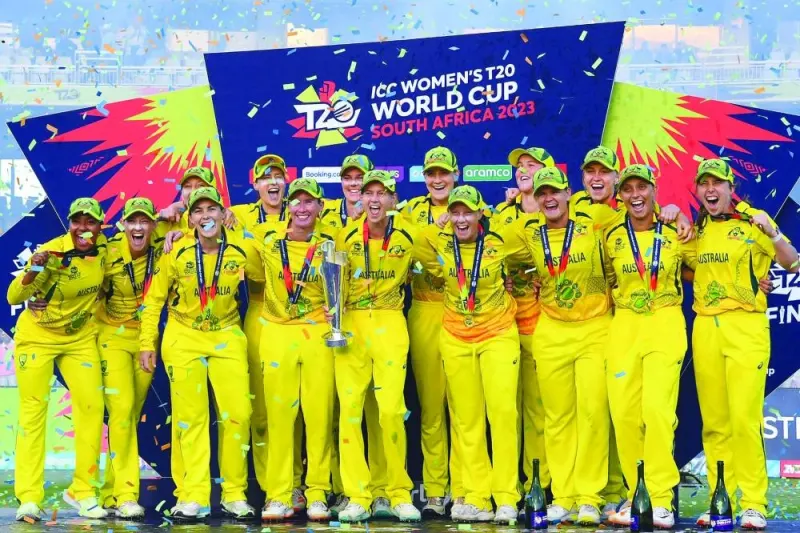 Australia’s captain Meg Lanning (centre) and her teammates celebrate after winning the Women’s T20 World Cup at Newlands Stadium in Cape Town, South Africa. (AFP)