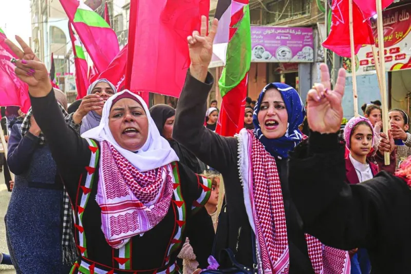 Supporters of the Democratic Front for the Liberation of Palestine (DFLP) group take part in a rally in Rafah town in the Southern Gaza Strip, on February 26, 2023, in support of the West Bank and Palestinians in Israeli jails, and against the Palestinian-Israeli Aqaba summit. (Photo by SAID KHATIB / AFP)