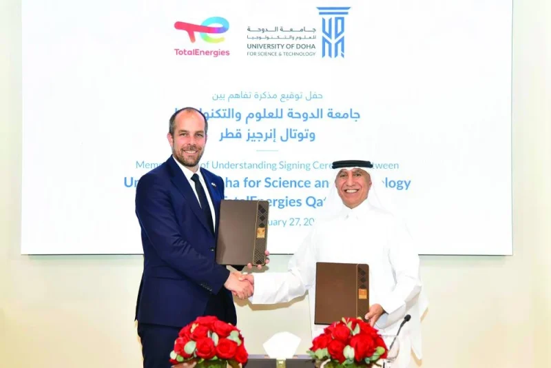 Matthieu Bouyer and Dr Salem Al-Naemi at the agreement signing ceremony.
