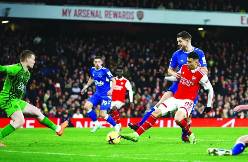 Arsenal’s Gabriel Martinelli (right) scores against Everton during the Premier League match at the Emirates Stadium in London. (Reuters)
